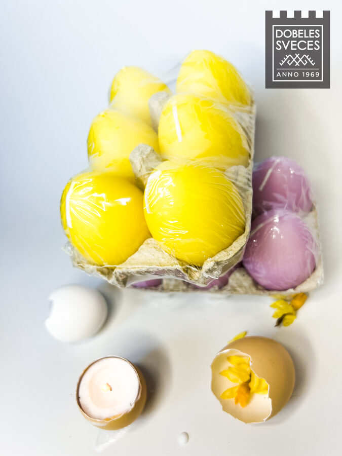 Presēta parafīna pulvera figūrsveces - dzeltenas olas, olu kastītē